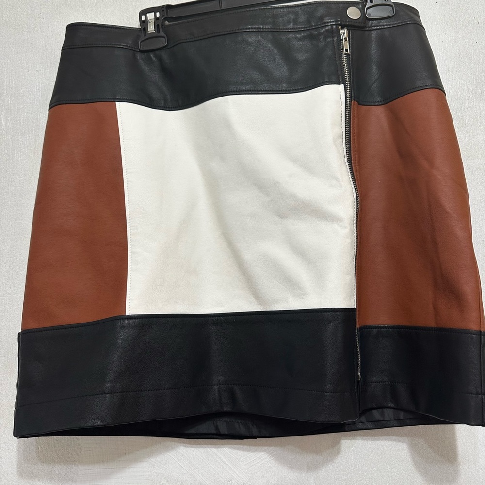 A faux leather patchwork skirt, size 16P by INC international.